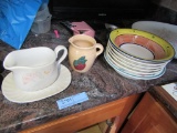 VARIETY OF POTTERY DISHES AND PITCHERS
