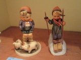 2 HUMMEL FIGURINES - SKIER AND BOY WITH PIGS