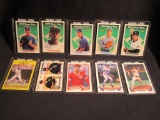 ASSORTMENT OF BASEBALL CARDS IN PLASTIC CASES. SEE PICTURES FOR DESCRIPTION