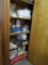 CUPBOARD LOT INCLUDING TUPPERWARE. SERVING PIECES. COFFEE MAKER. KITCHENAID