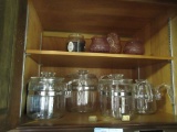 CUPBOARD LOT OF PYREX COFFEE POTS AND CANDLES