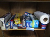 CUPBOARD LOT OF PAPER PRODUCTS