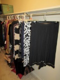 WOMEN'S CLOTHES ON RIGHT OF CLOSET. MOSTLY SIZE 6