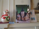 PLASTIC SNOWMAN AND PORCELAIN LIGHTED CHURCH, AND 2 NATIVITY FIGURINES