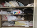 ASSORTMENT OF LINENS IN CLOSET AND DRAWERS