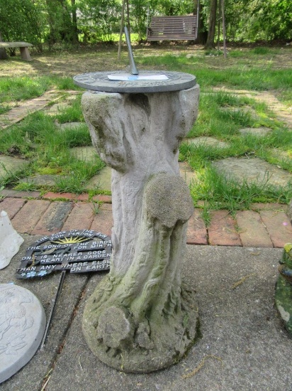 METAL SUNDIAL ON CONCRETE STAND