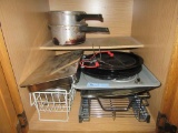 PANS, RACKS, AND ETC IN BOTTOM CABINET