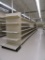 LOT 9 SECTIONS OF DOUBLE SIDED GONDOLA SHELVING AND 2 END CAPS