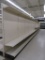 LOT 10 SECTIONS OF DOUBLE-SIDED GONDOLA SHELVING AND  ONE END CAP