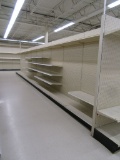 LOT 10 SECTIONS OF DOUBLE-SIDED GONDOLA SHELVING AND ONE END CAP