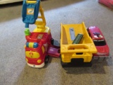 CAT DUMP TRUCK AND OTHER SMALL TRUCKS