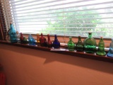LOT OF COLORED BOTTLES