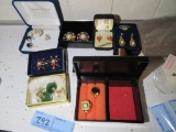 A VARIETY OF COSTUME JEWELRY MATCHING EARRINGS, RINGS, AND A FEW GOLD COLOR