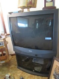 TOSHIBA TV AND TV STAND