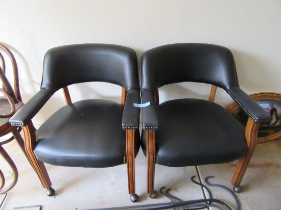 2 ROLLING FAUX LEATHER ARMCHAIRS