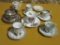 TEA CUPS AND SAUCERS