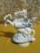 CLOWN ON UNICORN MUSICAL FIGURINE