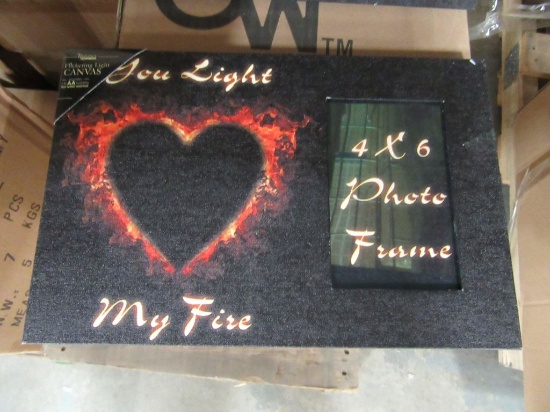 23 CASES OF LIGHTED LIGHT MY FIRE FRAME. 12 PIECES PER CASE