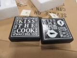 34 CASES OF KISS THE COOK ORNAMENT 2 ASSORTED. 24 PIECES PER CASE