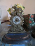 VINTAGE METAL AND WOODEN CHERUB STYLE CLOCK. NEEDS REPAIRED