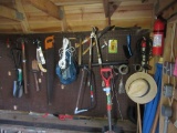 HAND TOOLS, WOODEN LADDER, AND ETC ON PEGBOARD AND IN CORNER