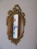 GOLD OVAL WALL MIRROR