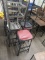 (4) BISTRO STOOLS. ONE IS DAMAGED. WITH ONE EXTRA STOOL THAT HAS GRAY FRAME