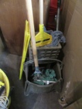 MOP BUCKET WITH MOPS AND WET FLOOR SIGN