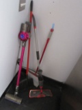 LOT OF BROOM AND CLEANING ITEMS. DYSON PORTABLE SWEEPER