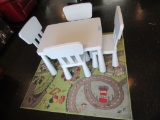 PLASTIC CHILDREN'S TABLE AND CHAIRS AND PLAY CARPET