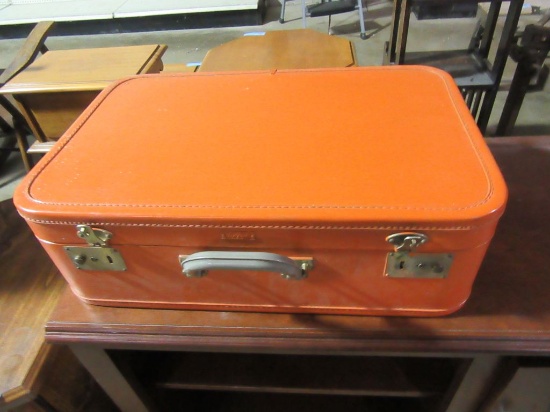 ORANGE SUITCASE BY AIR PAK