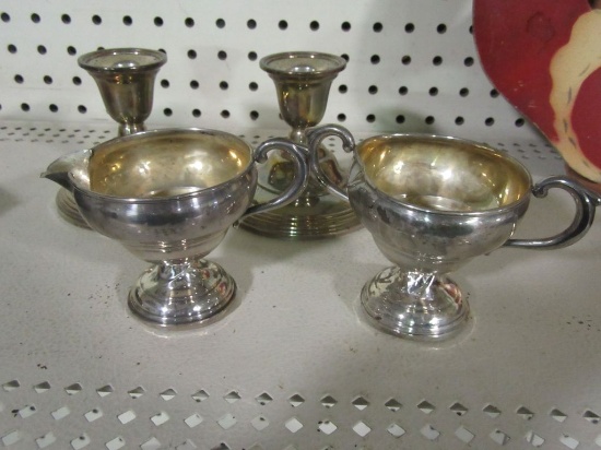 STERLING SILVER WEIGHTED CREAMER, SUGAR, AND CANDLE STICKS. ( SUGAR IS DAMA
