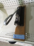 METAL NUT CRACKER ON WOOD BASE