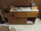 WOODEN CABINET WITH FORMICA TOP. IN BASEMENT. BRING HELP TO REMOVE.