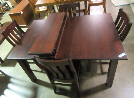 NEW BROWN MAPLE TABLE WITH 4 CHAIRS AND 2 EXTRA LEAVES.