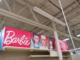 BARBIE SIGNS ON RIGHT AND LEFT AND MIDDLE SHELVING