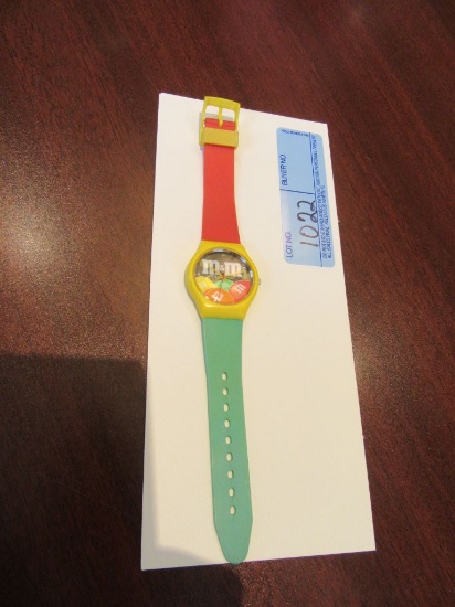 M&M CHOCOLATE CANDIES WATCH. PLASTIC CASE. STAINLESS STEEL BACK