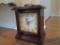 POWELL QUARTZ WOODEN CLOCK WITH OPENING AND CLOSING CLOCK FACE, AND INSIDE