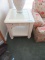 2 CREAM COLORED GLASS TOP END TABLES