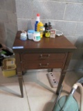SEWING MACHINE CABINET WITH SHOE SHINE ITEMS