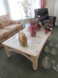 CREAM COLORED GLASS TOP COFFEE TABLE