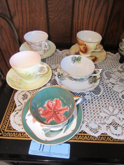 VARIETY OF CUPS AND SAUCERS