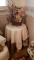 TABLE WITH FLORAL ARRANGEMENT