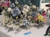 FLORAL ARRANGEMENTS. ONE HAS METAL BASE, THE OTHER IS HOMEMADE BASKET