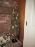 GINGERBREAD LIGHTED CHRISTMAS TREE. APPROXIMATELY 4 FOOT TALL