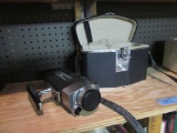 BELL & HOWELL MOVIE CAMERA FILMOSOUND 8 WITH CASE. FOAM IN THE BOTTOM OF TH