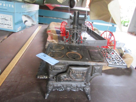 CAST IRON CRESCENT SALESMAN STOVE