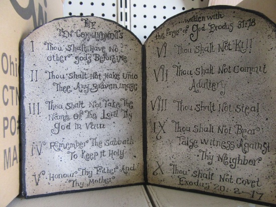 1 CASE (4 PIECES) OF CARVED IN STONE PLAQUES