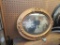 ORNATE GOLD OVAL FRAME WITH PICTURE