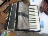 CAUERANO ACCORDION. MISSING PART OF NAME PLATE